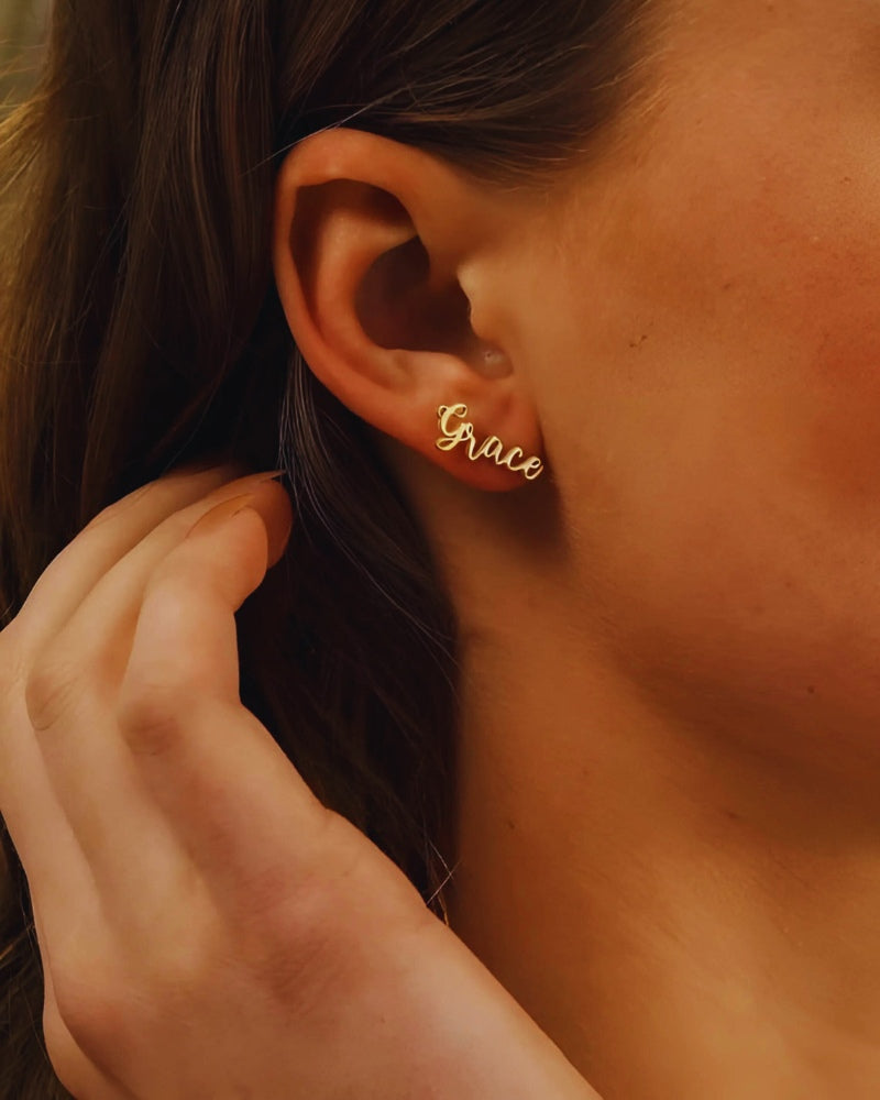 Woman wearing custom Whispering Wish earrings