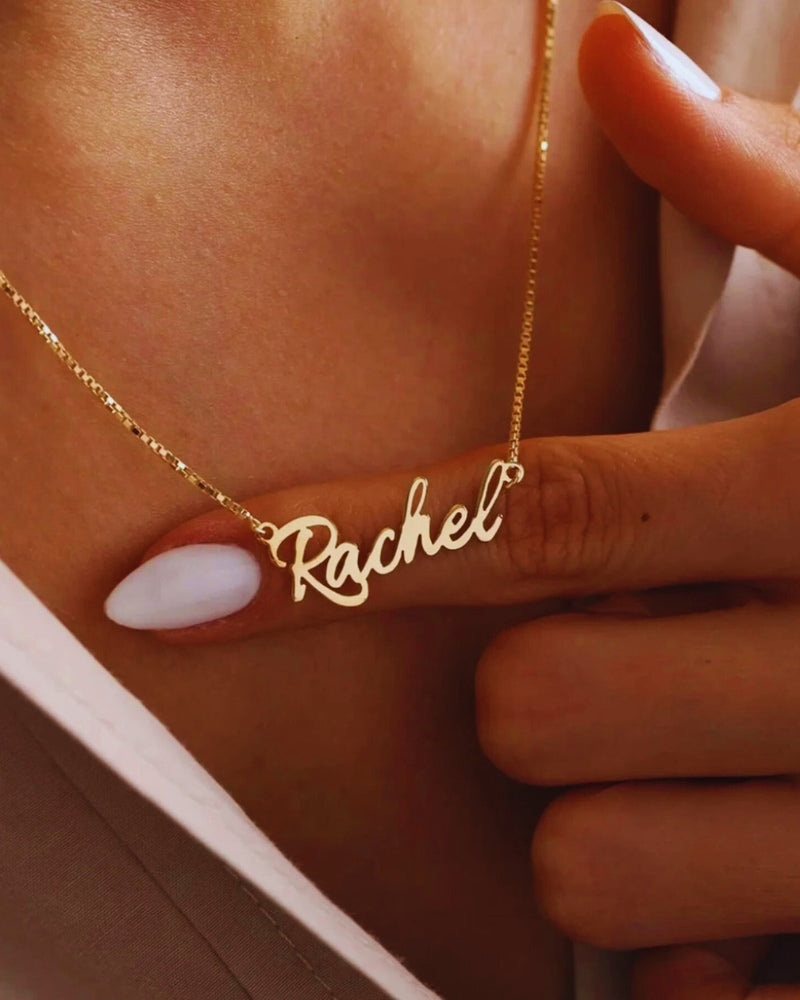 Woman wearing Whispering Wish custom name necklace